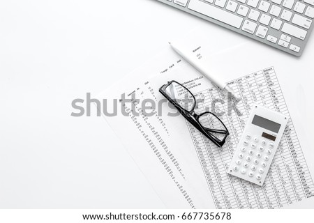 business accounter work with taxes and keyboard on white office desk top view mock up