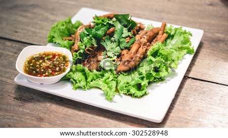 Thai food duck feet on table