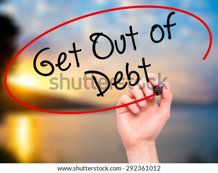 Man Hand writing Get Out of Debt with black marker on visual screen. Isolated on nature. Business, technology, internet concept. Stock Image