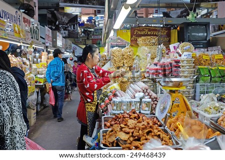 CHIANG MAI, THAILAND - JAN 10: The lady is selling food at Warorot Market on Jan 10, 2015 in Chiang Mai, Thailand. The market has been in operation since 1910.