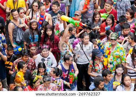 BANGKOK - APRIL 13,2015: BANGKOK - A water fight during Songkran Festival celebrations on Silom Road in Bangkok Thailand.
