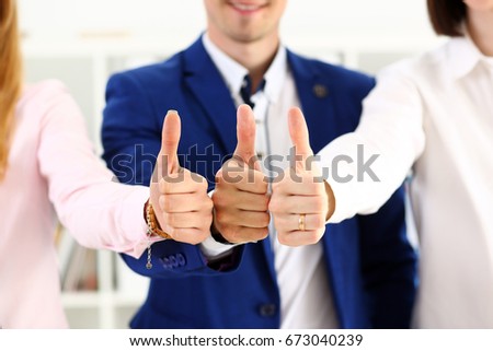 Group of people show OK or approval with thumb up during conference closeup. High level quality product, serious offer, excellent education, mediation solution, creative advisor participation concept