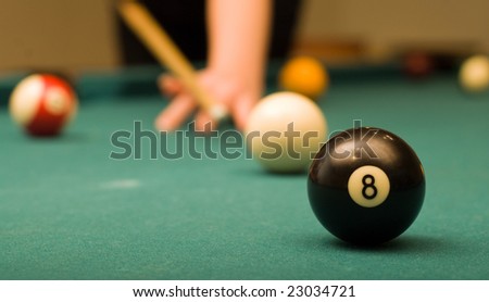 Billiard game (black ball in focus)