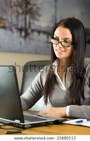 Young beautiful woman with laptop
