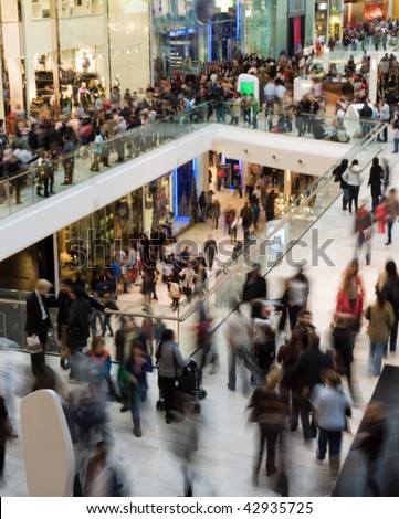 Crowd in the mall (motion blurred)