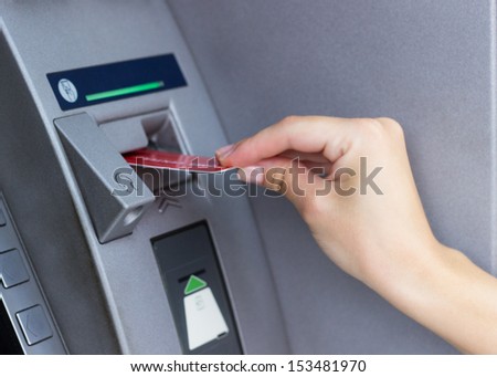 Woman Using Atm