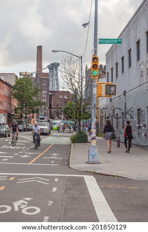 NEW YORK - JUNE 27: Brooklyn bike lane on June 27th, 2014 in Brooklyn, New York. Bike lanes are becoming a fixture of New York City streets.