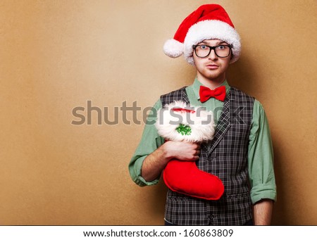 hipster in Santa Claus clothes with the socks of the presents