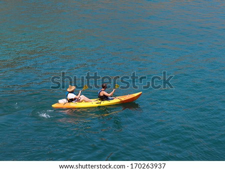 Kayak. People kayaking in the ocean.Top view