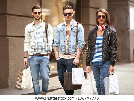 Three Young male fashion shop shopping walk