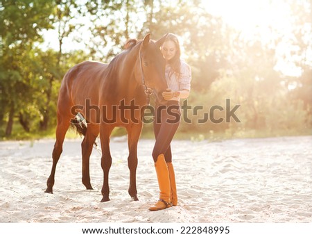 Beautiful woman and horse