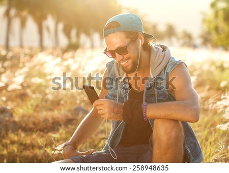man listens to the player on the street