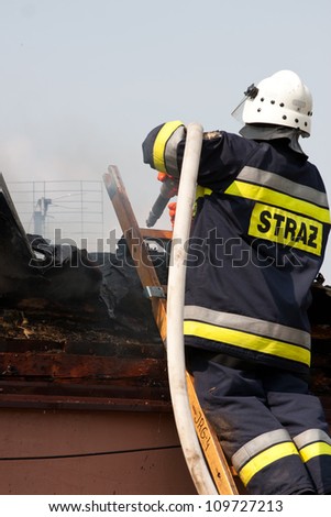 fire in small village in Poland, rescue action