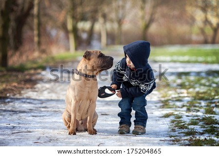 Boy With Cute Dog, Giving Him A Kiss