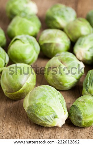 Brussels sprouts on wooden board