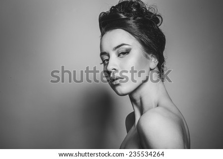 Black and white photos of a beautiful girl with beautiful hair, beautiful eyes, lips, interesting hairstyle