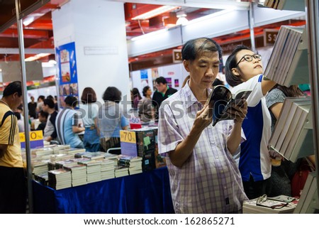 Bangkok, Thailand - October 18, 2013 : Unidentified visitors  buy the books on October 18, 2013 in Bangkok, Thailand