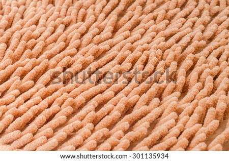 Seamless carpet pattern. Beige carpet texture macro.