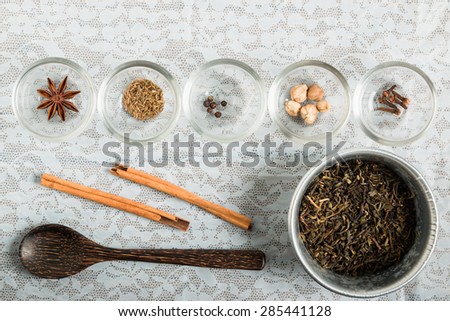 masala chai with spices. Cinnamon Stick, Thai Cardamom, Ginger, Clove, Star Anise, Black Peppercorns, Fennel Seeds, Black Tea