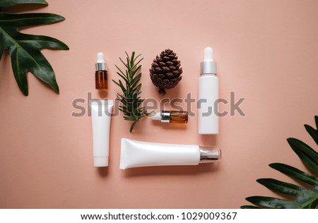 natural cosmetic cream , serum, skincare blank bottle packaging with leaves herb, wood . bio organic product.beauty and spa concept.