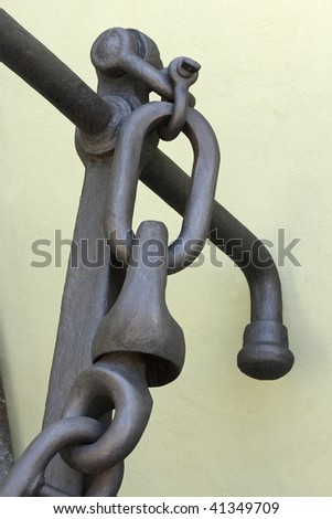 The stock and chain of an old anchor
