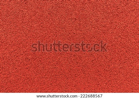 Close up of red rubber floor background.