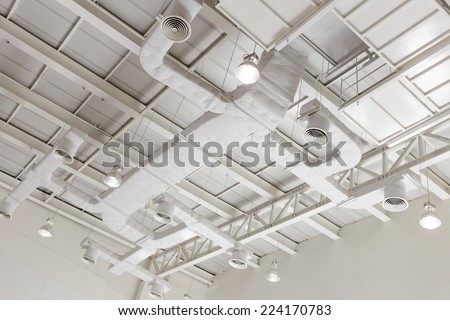 Indoor ventilation system on hight ceiling of large building.
