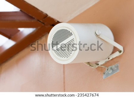 Close up of speaker on a wall