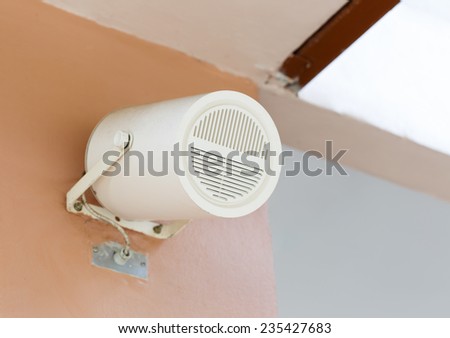 Close up of speaker on a wall