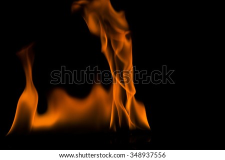 Abstract orange and black fire flames on a black background