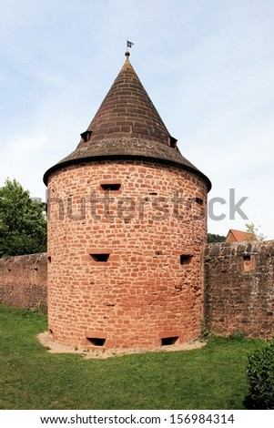 Buedingen Wetteraukreis in Hessen. Tower of the bulwark on the west side of the town. View of a part of the old city wall.