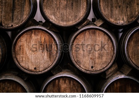Wine casks at the winery. Stacked Wine barrels at the german winery.