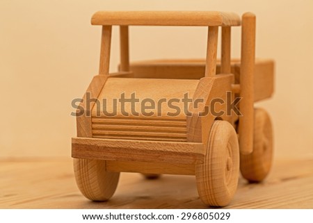Vintage German children toy wooden beige car truck made from eco-friendly organic natural material without driver