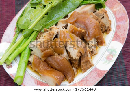 chinese food stewed pork leg with kale