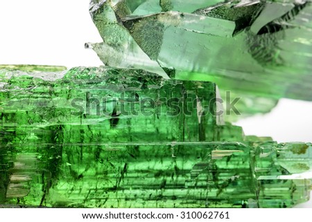 Gross green tourmaline crystal with all its shades of green and natural texture