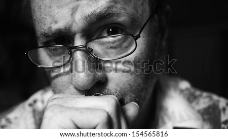 Stop worrying - man in glasses with troubled or stressed expression