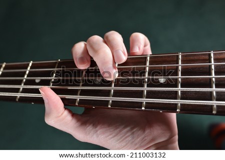Playing guitar in a guitar lesson