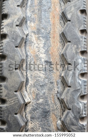 Damaged steel belted radial tires with delaminating, peeling, and exposed belts