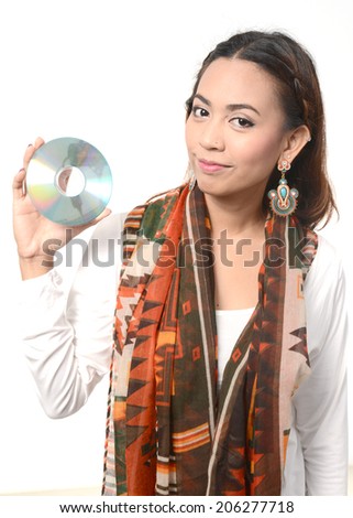 beautiful young girl holding a disc(CD, DVD or Blu-ray) , isolated on white background