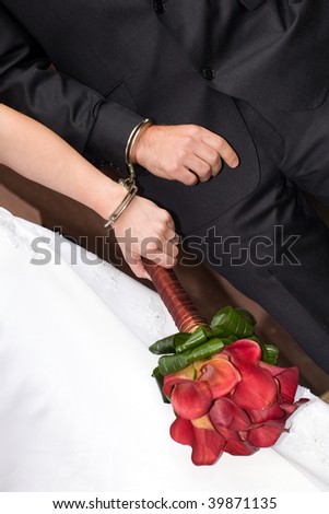 stock photo wedding details newlyweds in handcuffs