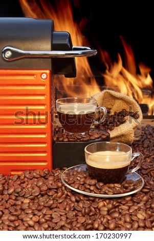 Capsule Coffee Machine and two coffee cup with espresso. You can see more hot drinks and fire on my page