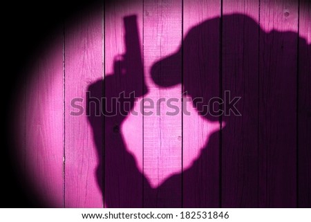 Secret service agent, bodyguard, policeman in silhouette on natural wooden background. You can see more crime scene in my set.