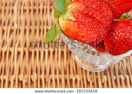 Three Fresh Summer Organic Strawberries Still Life, with space for text or image.