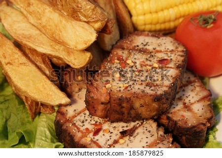 Grilled Pepper Steaks and  Wedges Potato. You can see more BBQ, grilled food, flames and fire on my page.