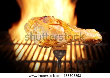Grilled chicken leg and flaming grill in background. You can see more BBQ food, BBQ Tools, Flaming Grill, Burning&Glowing Coal in my image gallery and public sets.