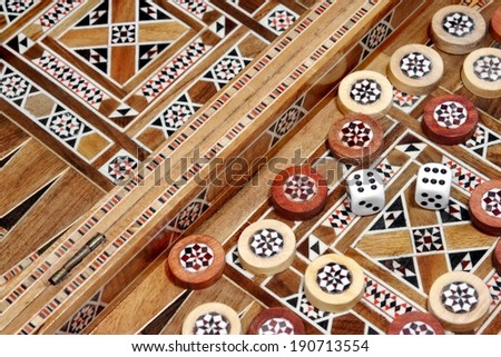 Backgammon Board and and two dice. Background, with space for text or image.