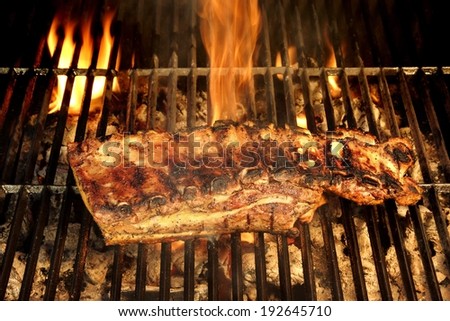 Grilled Ribs on the BBQ Grate. You can see more BBQ, Grilled food, flames and fire on my page.