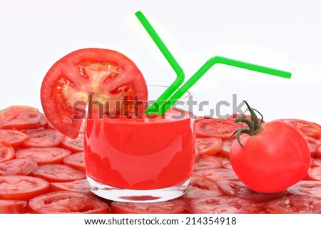 Tomato Juice in glass, tomato and tomato slice isolated on white background