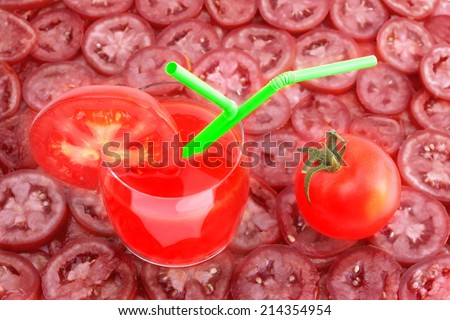 Tomato Juice in glass, tomato and tomato slice isolated on white background