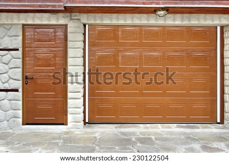 Automatic Roll-up Garage Gate and Door in White Natural Stone Wall